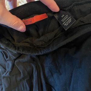 Asymmetrical black BKE red skirt